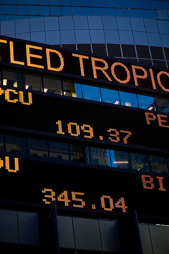 Picture depicting a ticker board in the NYSE