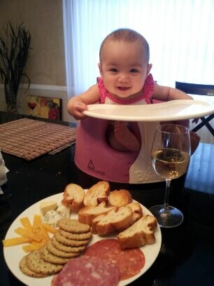 She can't eat solids yet, but I'm sure she'll like cheese & deli platters like we do. 