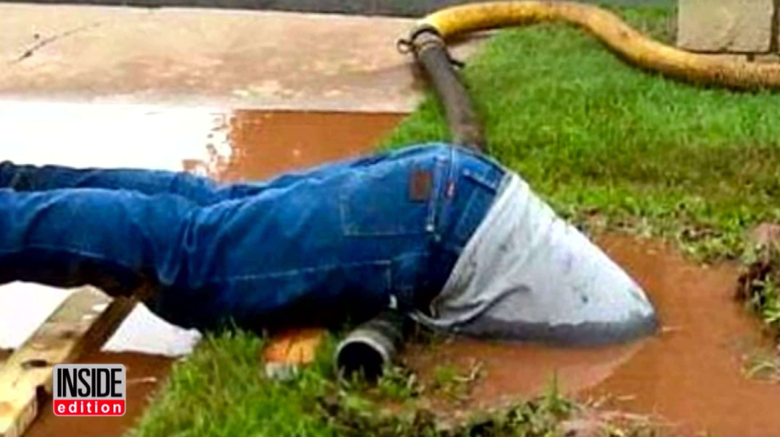 Picture of Jimmie Cox (plumber) submerged to fix a broken pipe